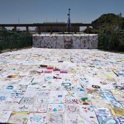 Peace quilt spread in front of the Knesset